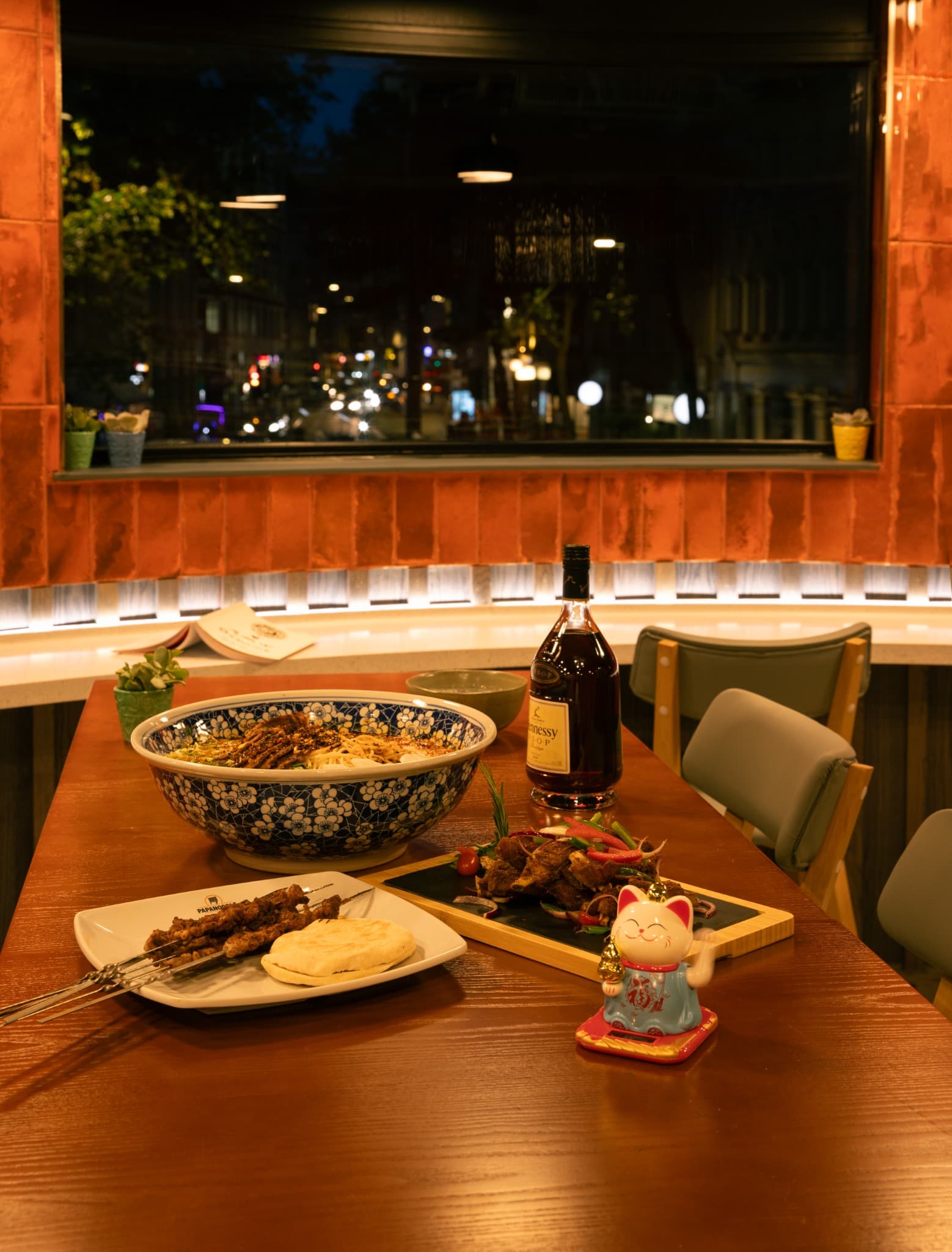 A meal shared at the window table